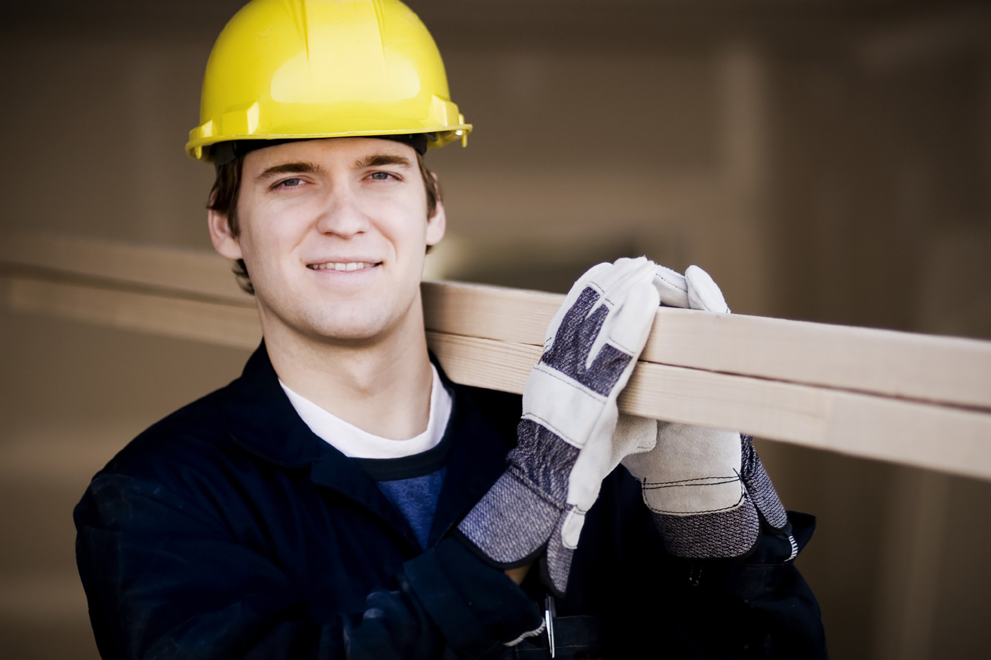 Construction worker in a yellow hard hat.