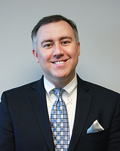 Headshot photo of Nick Lukson.