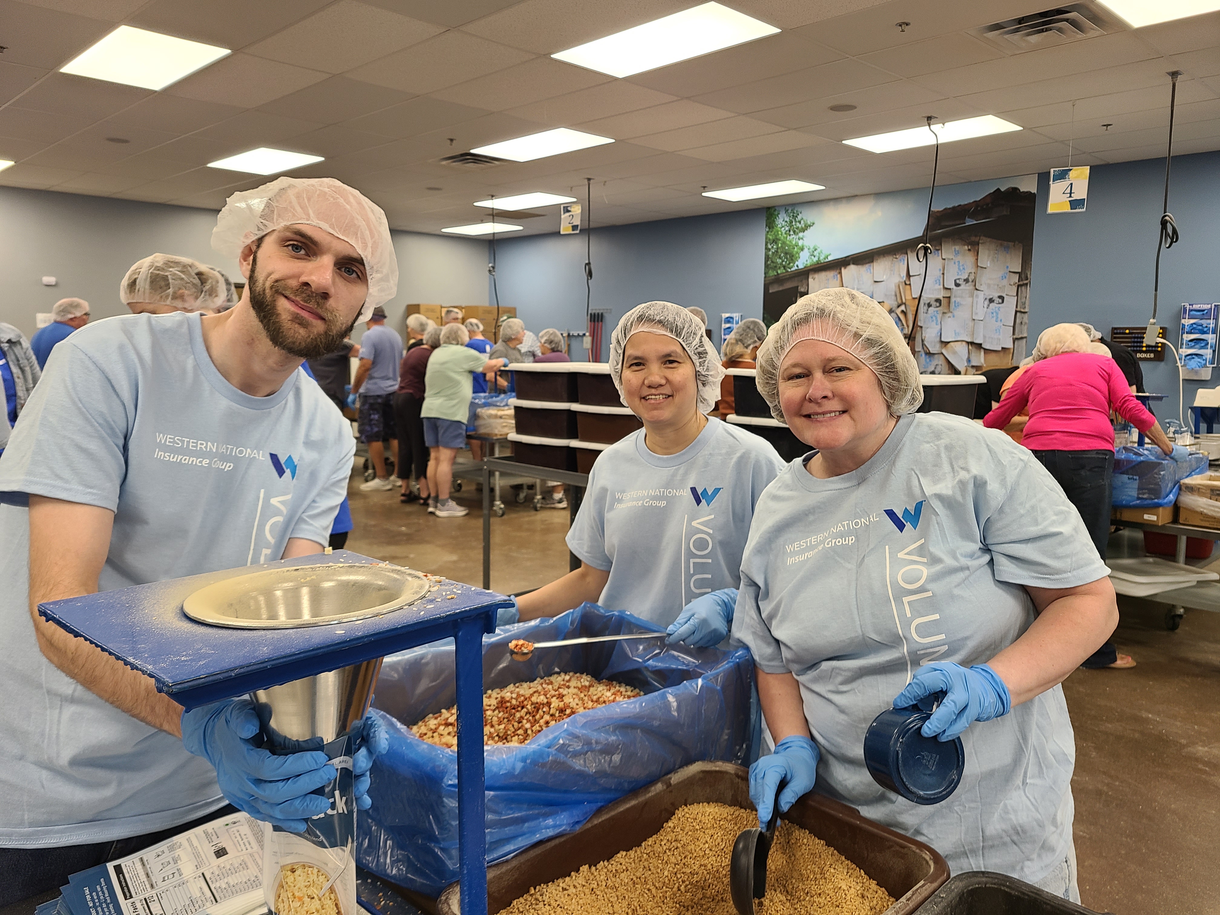 Western National employees packing meals at 